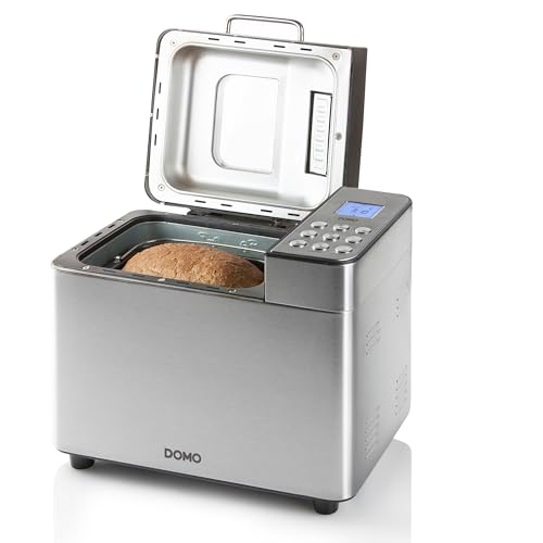 Domo B3971 couvercle ouvert, miche de pain complet dans la cuve antiadhésive, hublot visible dans le couvercle relevé et bandeau de commande à droite