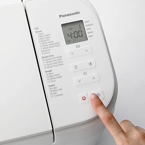 Bandeau de commande de la Panasonic SD-B2510WXE, écran LCD affichant 4:00 et les phases Rest, Knead, Rise, Bake, End, avec les 21 programmes listés en anglais